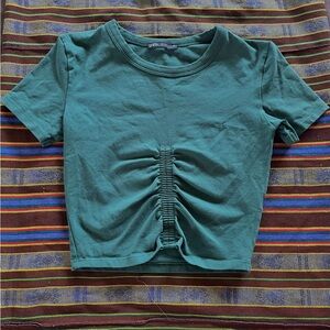 Zara cropped tee with flattering ruched detail in a women’s small.